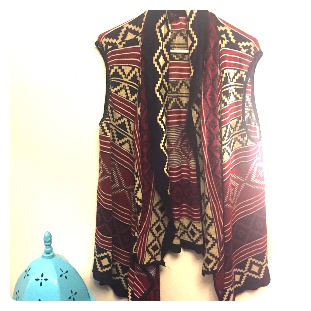 Sleeveless sweater wrap